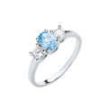 Silver Trilogy Ring Clear Round and Oval Aquamarine Blue CZs